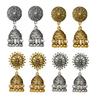

Gold Indian Jhumka earrings in antique finish bollywood oxidised finish traditional ethnic ornate art deco statement earrings