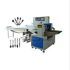 Automatic pillow disposable fork/knife/nakpin/spoon packing machine for fast food shop