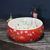 Jingdezhen ceramic sanitary ware art counter round ceramic wash basin flower and bird red color Bathroom sink