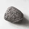 lava / basalt texture landscaping rock, river foam / porous pumice stone