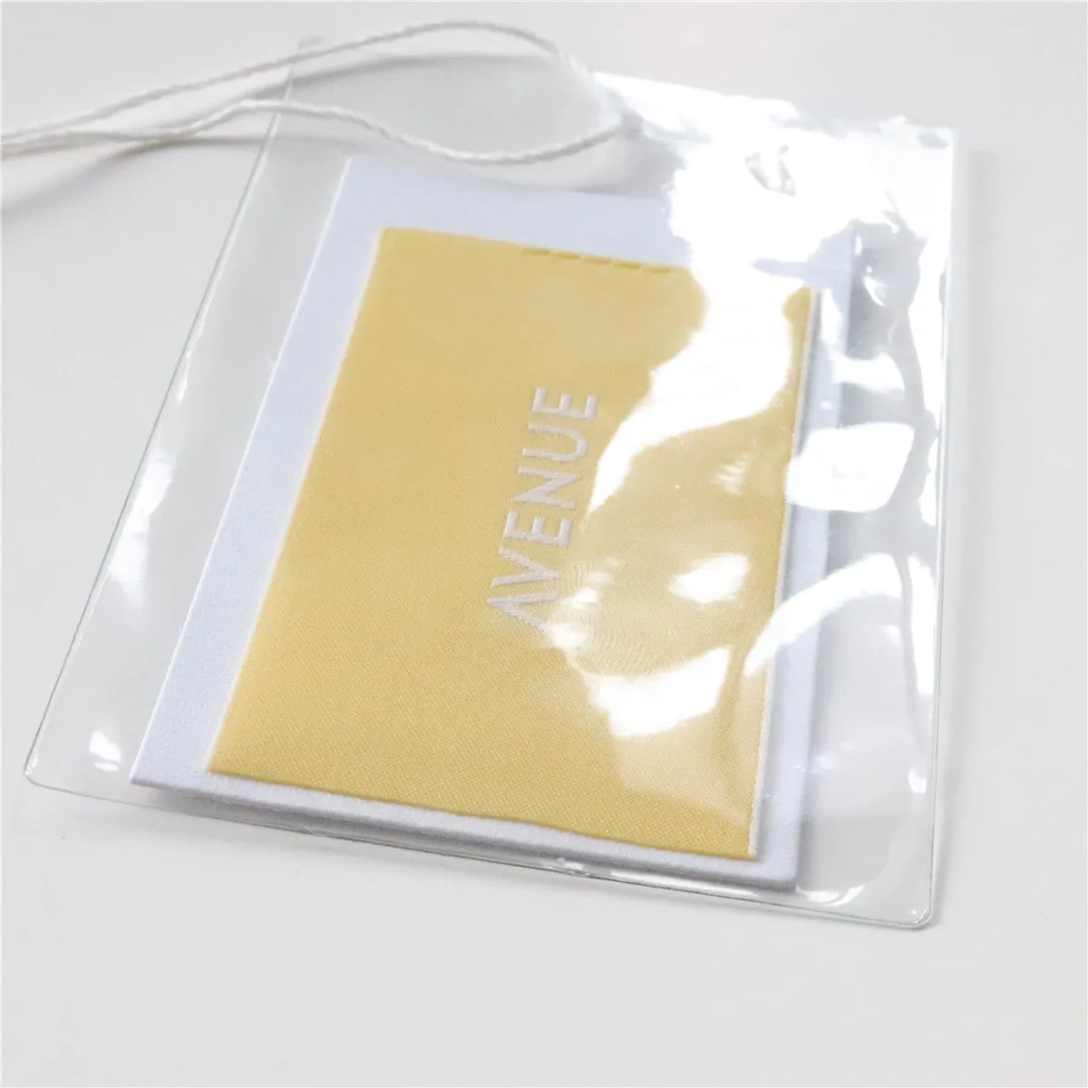 

Custom Newest Design Printed Logo Clothing Hang Tag In Garment Tags with Plastic Bag For Promotion Manufactory, Cmyk available