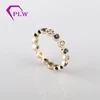 Provence gems Bezel set 2.5mm blue corundum and moissanite 14k yellow gold ring band