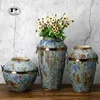 /product-detail/china-made-ceramic-vase-lion-head-flower-vase-for-sale-62107327512.html