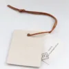 /product-detail/china-luxury-custom-logo-clothing-handbag-watch-pu-leather-swing-tag-cardboard-hang-tag-62096625890.html