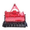 tractor mounted on stone picker