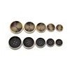Manufacturers direct sale spot supply circular four-eye resin button fashion novel two-color frosted concave button