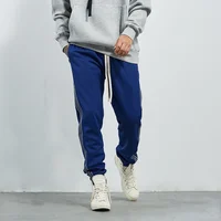 

2019 Wholesale polyester blank streetwear men jogger sweatpants fashion stripe blue sports jogger pants 3M reflect tapes