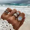 Sleek minimalist openwork triangle ring set with diamond drop color gemstone eye geometry joint ring four piece women jewelry