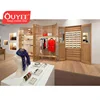 Fashion garments counter display / garment showroom interior design / jacket display stand for Clothes Shop