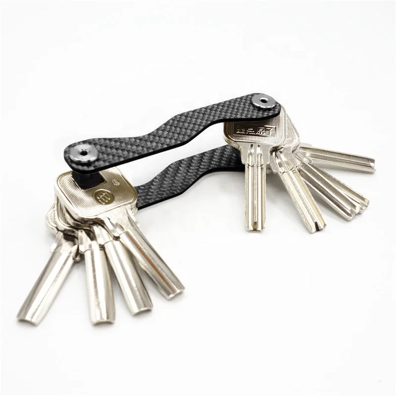

Premium Quality Lightweight Smart Pocket Carbon Fiber Compact Key Holder with Phone Stand & Bottle Opener up to 18 keys