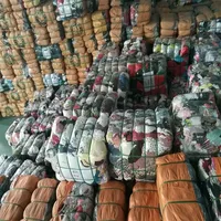 

UK bulk cargo stock used clothes in bale second hand clothing export in low price for retailers in africa