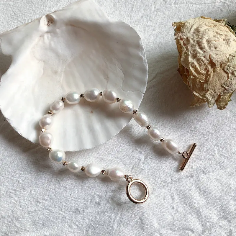 

INSTAGRAM Premium Gold Plated Alloy Natural Freshwater Pearl Bracelet