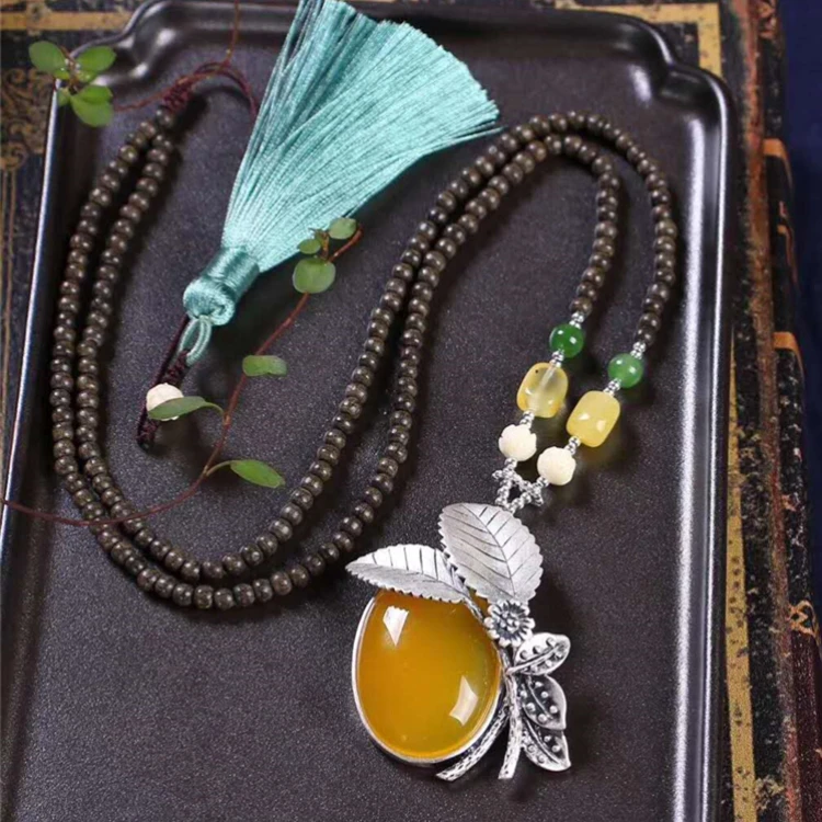 

Kalimantan agilawood beads necklace Thai silver natural canary stone pendant necklace new model necklace, Picture shows