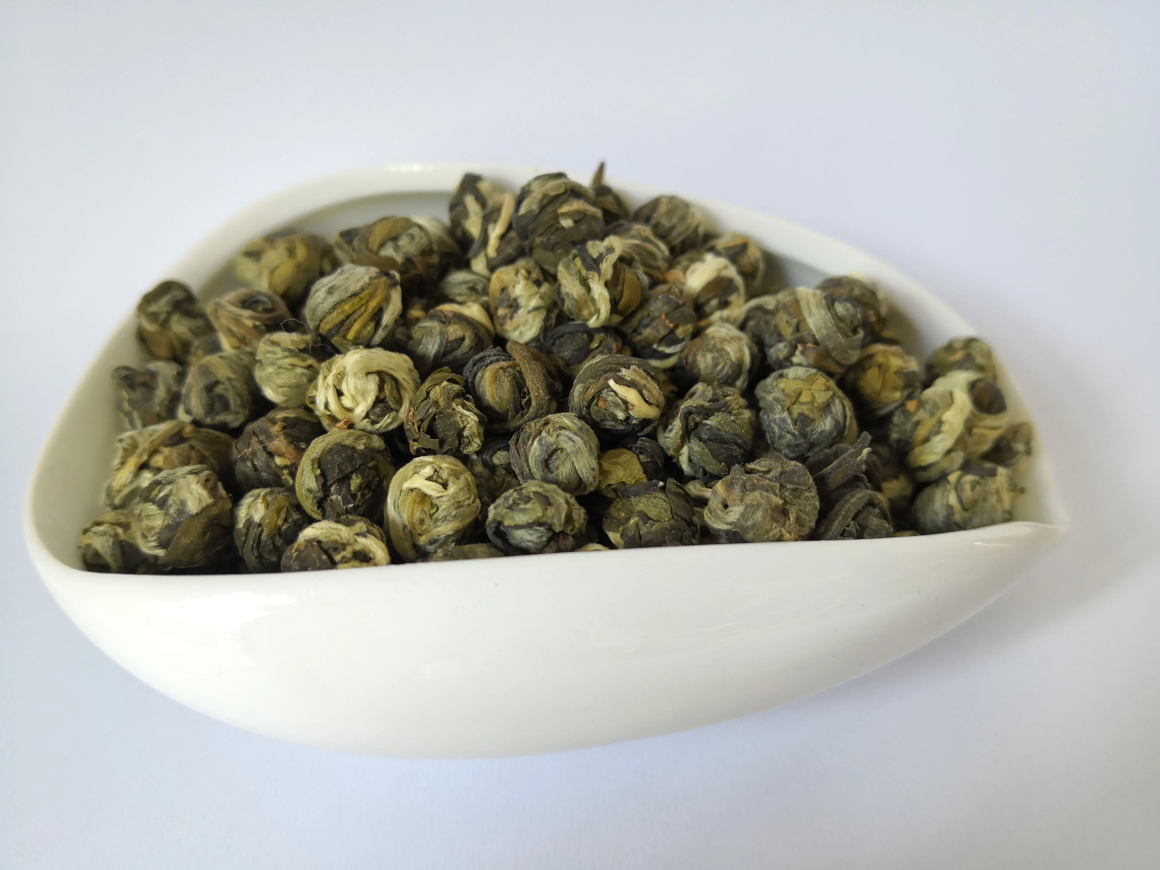 
Chinese loose leaf handmade tea dragon pearl green tea Jasmine tea 