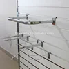 Garment store display hanging rail brackets for slatwall