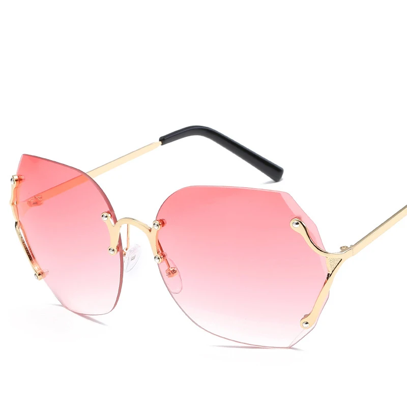 

Wholesale fashion big rimless frame sun glasses polygon shades good quality sunglasses