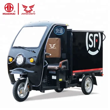 triciclo con caja de carga