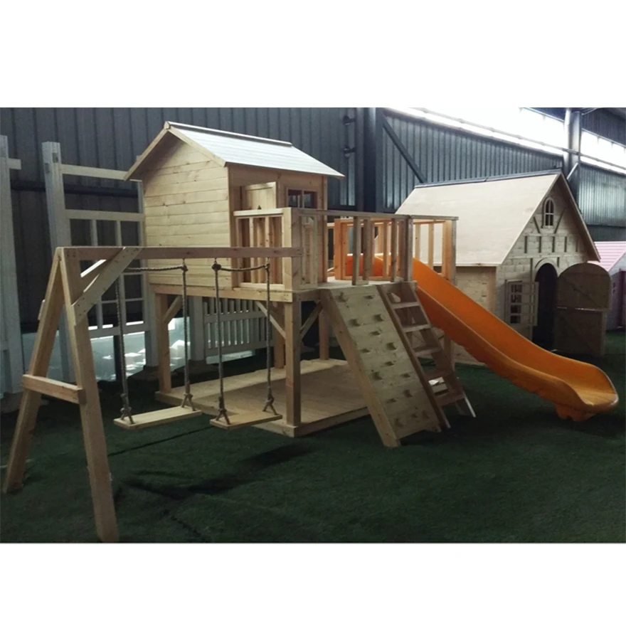 wooden playhouse with slide