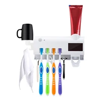 

Wireless Design Wall Mounted Automatic Toothpaste Dispenser with LED UV Light Sterilization Function