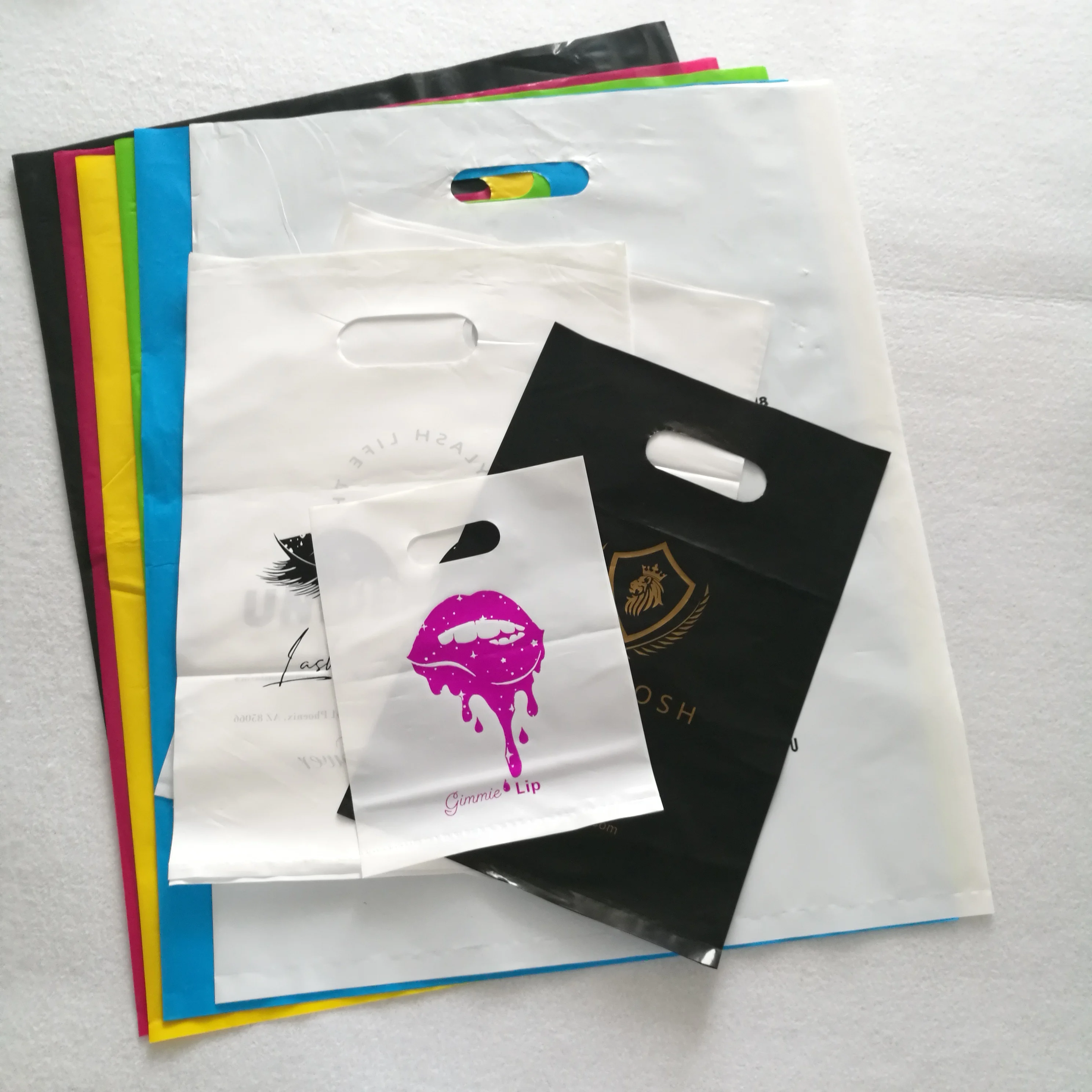 

Hot sell high quality HDPE handle promotion gloss poly plastic bags, Customized color