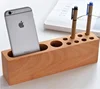 CNC Creative desktop wooden mobile phone charging bracket suitable for Iphone bamboo mobile phone bracket bamboo bracket