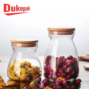 Image of Empty decorative glass 700ml food storage containers jars with airtight lids