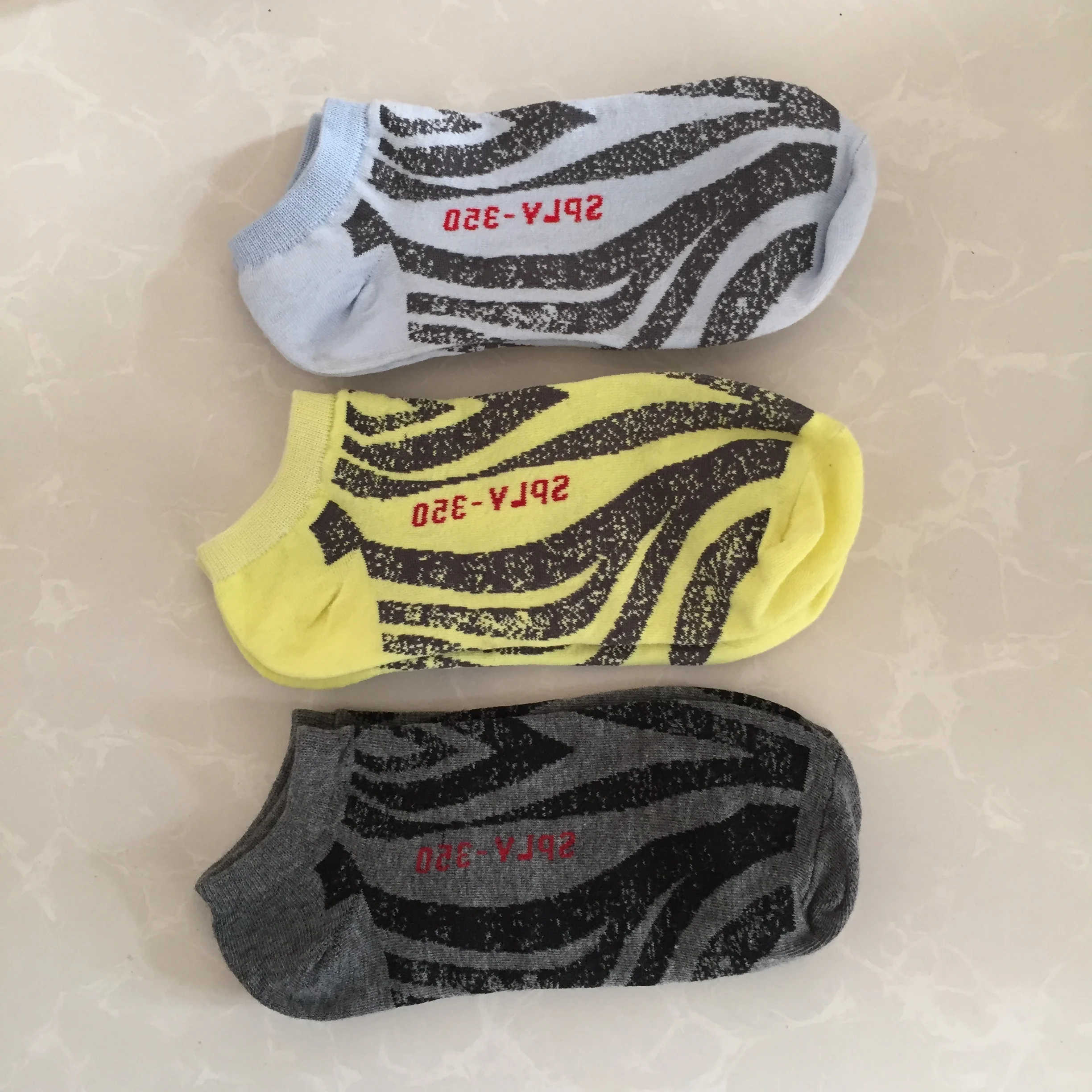 

New gray sock with the orange stripe yeezy beluga socks coming, Yeezy shoes design