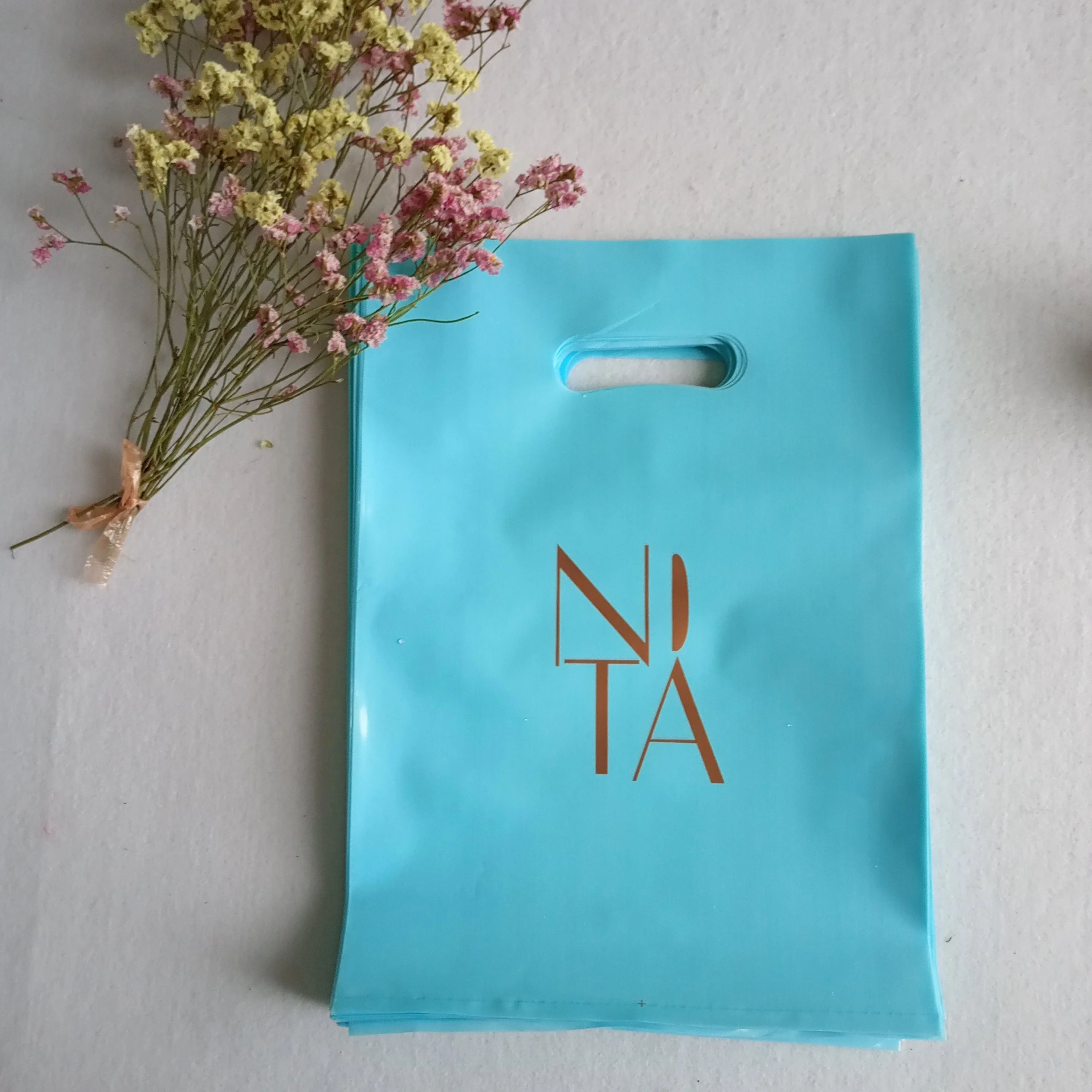 

Wholesale custom design logo printing cheap biodegradable die cut plastic shopping bag, Customized color