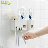 

Wall mounted toothbrush holder and toothpaste dispenser combine