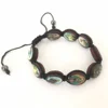 brown religious saint bracelet knitted by oval icon beads with epoxy rosary bangle for religious use