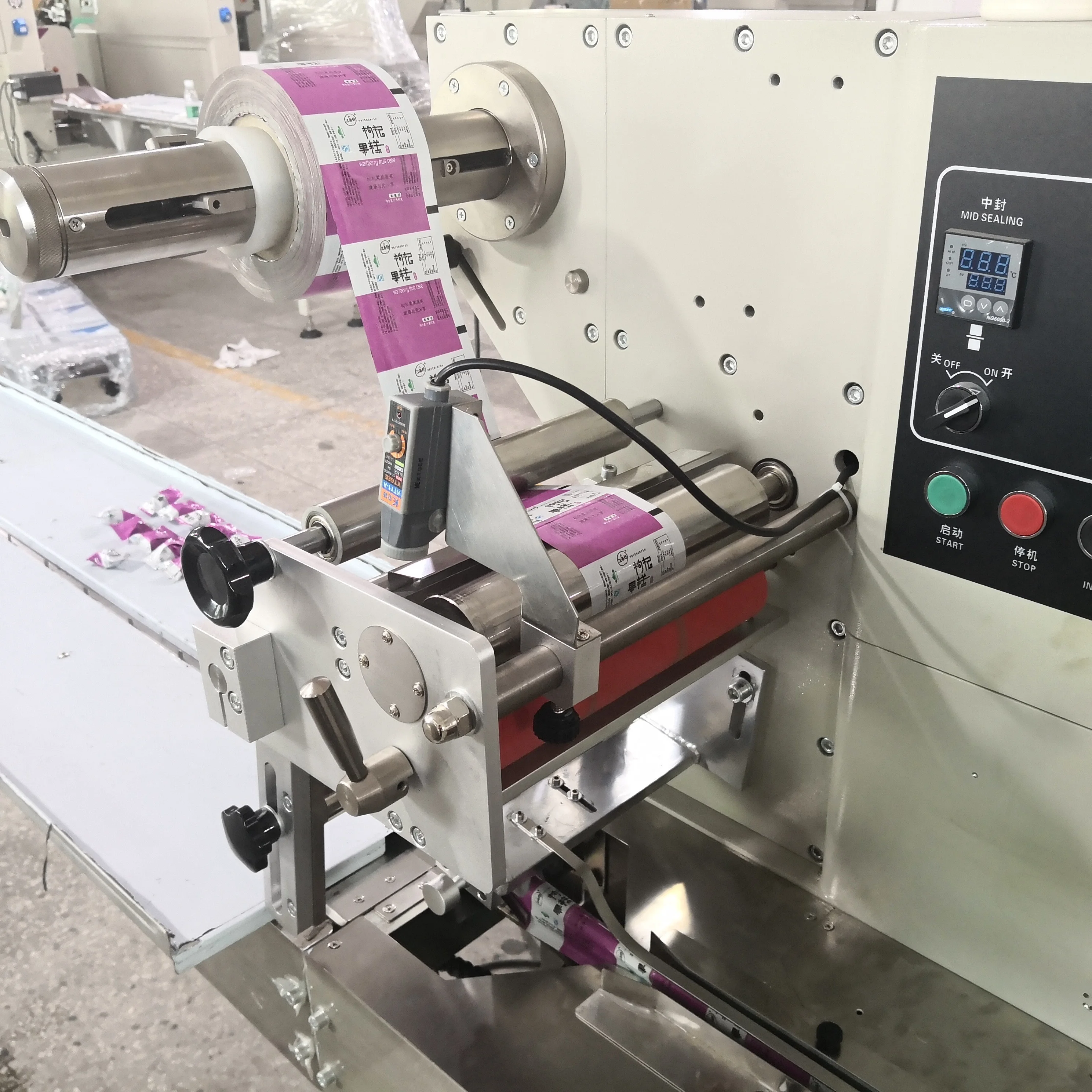 
Fully automatic horizontal wrapping flow pack packing machine ice cream lolly popsicle packaging machine 