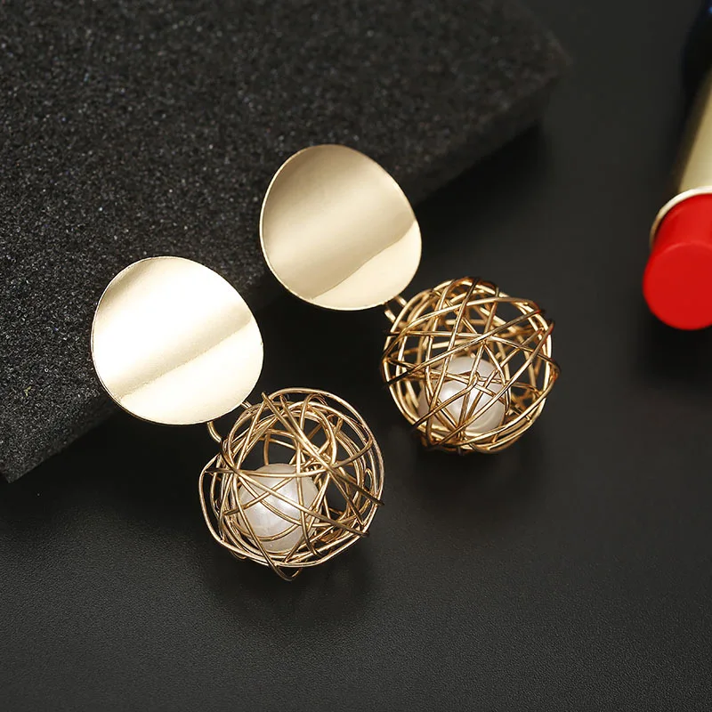 

Free shipping 2019 New Hollow Metal Ball Female Hanging Earrings Imitation Pearl Drop Earring Simple Women Fashion Jewelry, Picture