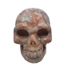 Wholesale 4 inch crystal craft hand carved raw natural crystal quartz skulls