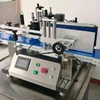 Tabletop automatic labeling machine for glass round bottle beverage bottles