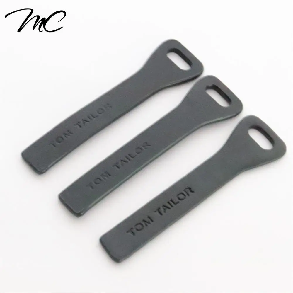 

Wholesale Custom Brand Black Zipper Pull Leather Zipper Puller With Debossed Logo For Clothes Handbags, Customized