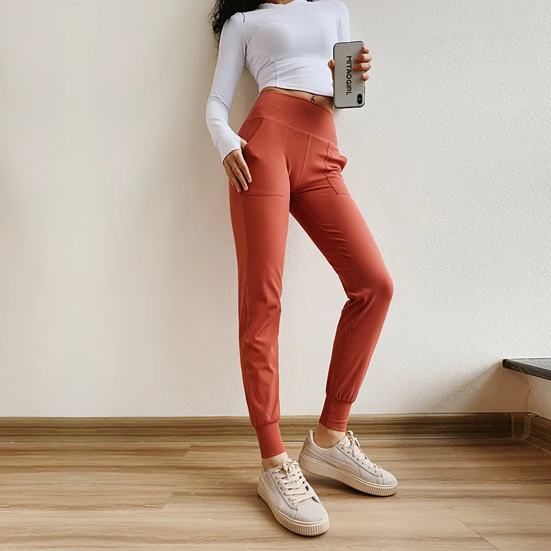 

Wholesale Ribbed Fabric Loosed Med Waist Harem Girls Wearing Yoga Pants