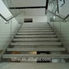 solid stainless steel staircase with structural glass balustrading