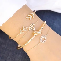 

4pcs/Set Fashion Bohemia Leaf Knot Hand Cuff Hollow Link Chain Charm Bracelet Bangle for Women Gold Bracelet set Female Jewelry