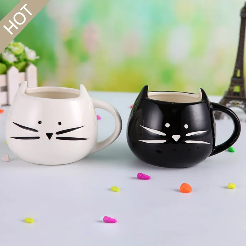 

White and black ceramic cat coffee mug