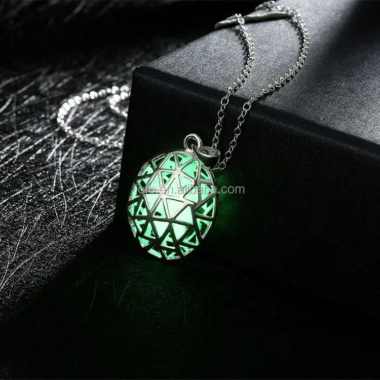 

Women Silver Hollow Oval Necklace Pendant Luminous Glow in The Dark Necklace, Green blue light blue