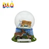 Snow mountain design resin cow figurine snow globe