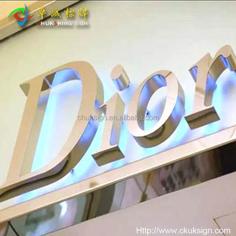Storefront outdoor mirror stainless steel back lit halo lit channel letter sign
