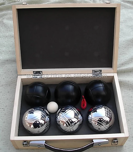 white wooden case with silver and black ball.JPG