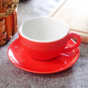 Image of ceramic bright colored tea cups and saucers