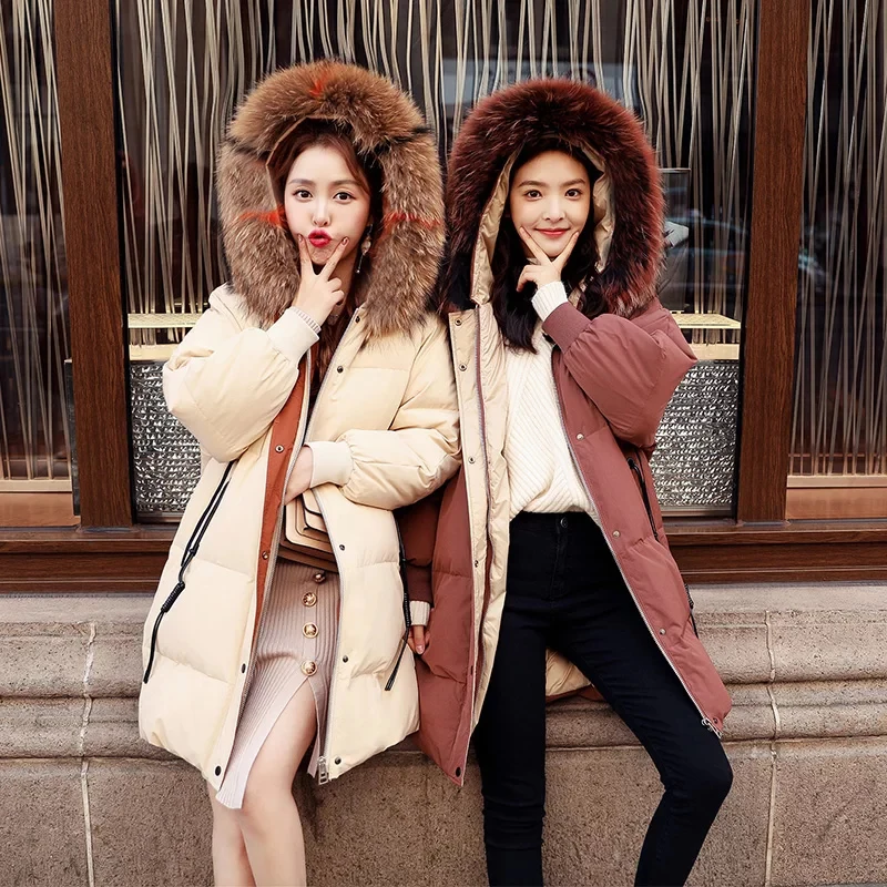 

Wholesale Hot sell Ladies Long Winter Warm Coat With Raccoon Fur Collar Thick Down Jacket For Women, Photo colors or customized