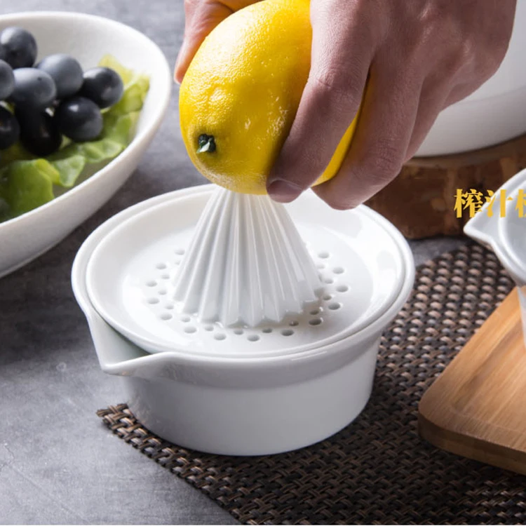 

Creative home kitchen use chinese style high quality cheap white glazed fruit/orange ceramic juicer