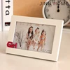 simple style cute girl painting wooden photo frame have "girl" words on it