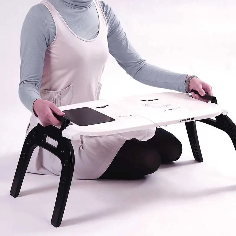 

Portable folding height and angle adjustable laptop table using brand new ABS plastic Produced laptop stand, White