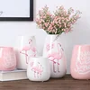 /product-detail/embossed-porcelain-elegance-white-flamingo-ceramic-flower-vase-62009722244.html