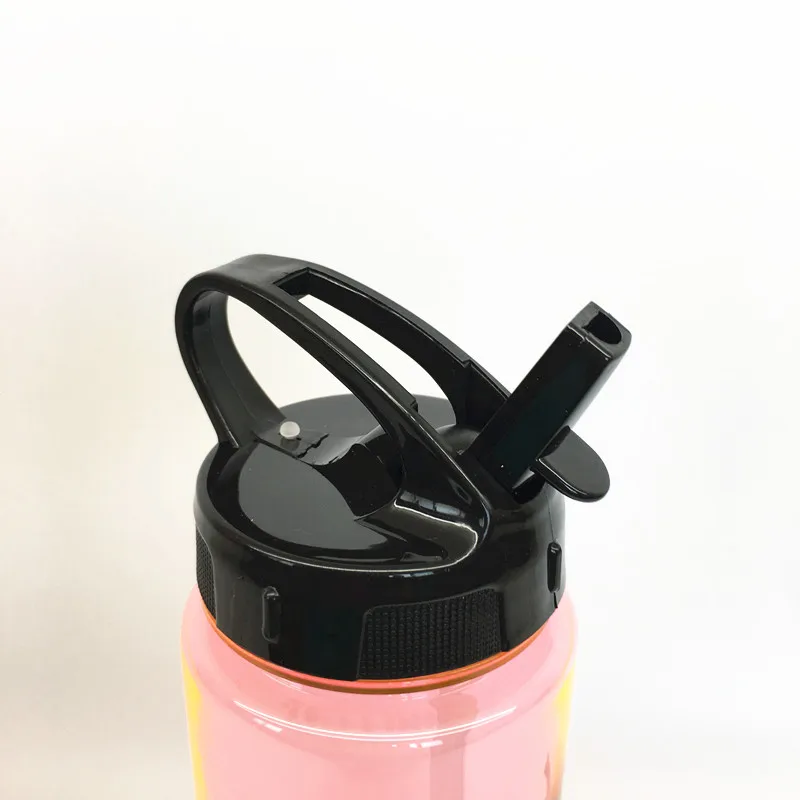 clear plastic bottle with straw